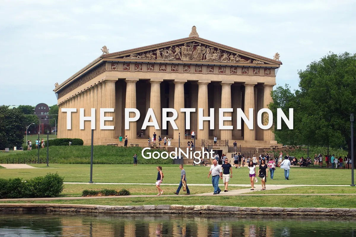 An exterior shot of the Parthenon in Centennial Park, surrounded by lush greenery and featuring visitors exploring the iconic landmark. The image highlights one of the city's most famous attractions within walking distance of the penthouse.