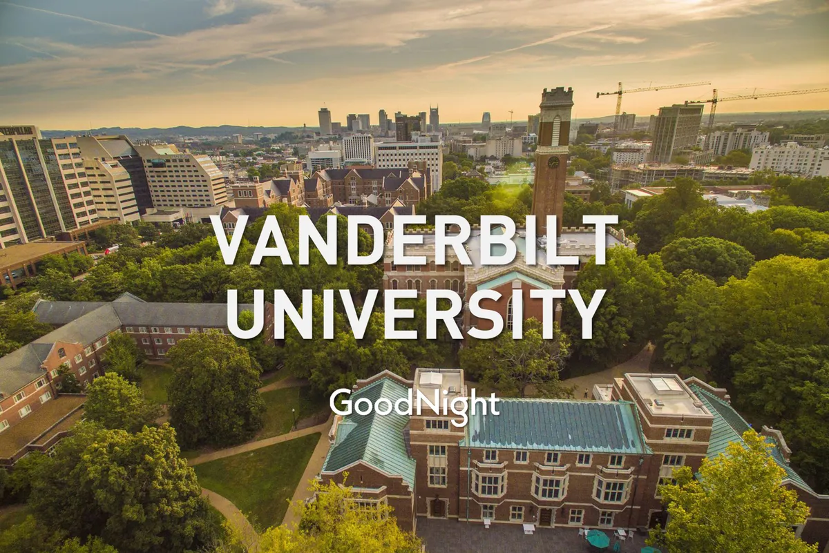 The image captures an inspiring view of Vanderbilt University’s classic campus buildings, abundant greenery, and a glimpse of the Nashville skyline and iconic clock tower. The setting feels prestigious and accessible, inviting exploration and emphasizing the area’s academic and professional significance.